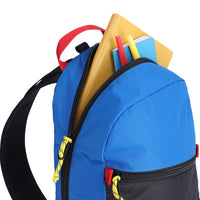 Open main compartment view of Topo Designs Light Pack in recycled "Black / Blue" nylon.