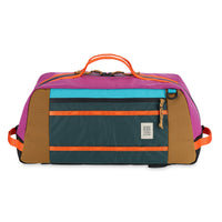 Topo Designs Mountain Duffel 40L backpack gear bag in recycled "Botanic Green / Grape" nylon.