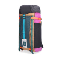Side view of Topo Designs Mountain Pack 16L hiking backpack with internal laptop sleeve in lightweight recycled nylon "Botanic Green / Grape".