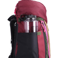 Side shot of Topo Designs Mountain Pack 28L hiking backpack with external laptop sleeve access in lightweight recycled "Burgundy / Dark Khaki" nylon.