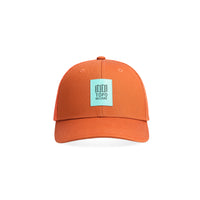 Front shot of Topo Designs Trucker Hat with mesh back and original logo patch in "Clay".