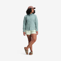 Model shot of Topo Designs Women's Dirt Shirt in "Sage" Green Blue.