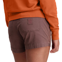 Detail shot of Topo Designs Women's Dirt Crew sweatshirt in 100% organic cotton French terry in "Brick" orange.