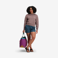Model shot of Topo Designs Women's Dirt Crew sweatshirt in 100% organic cotton French terry in "Peppercorn" purple brown. Show on "sage".