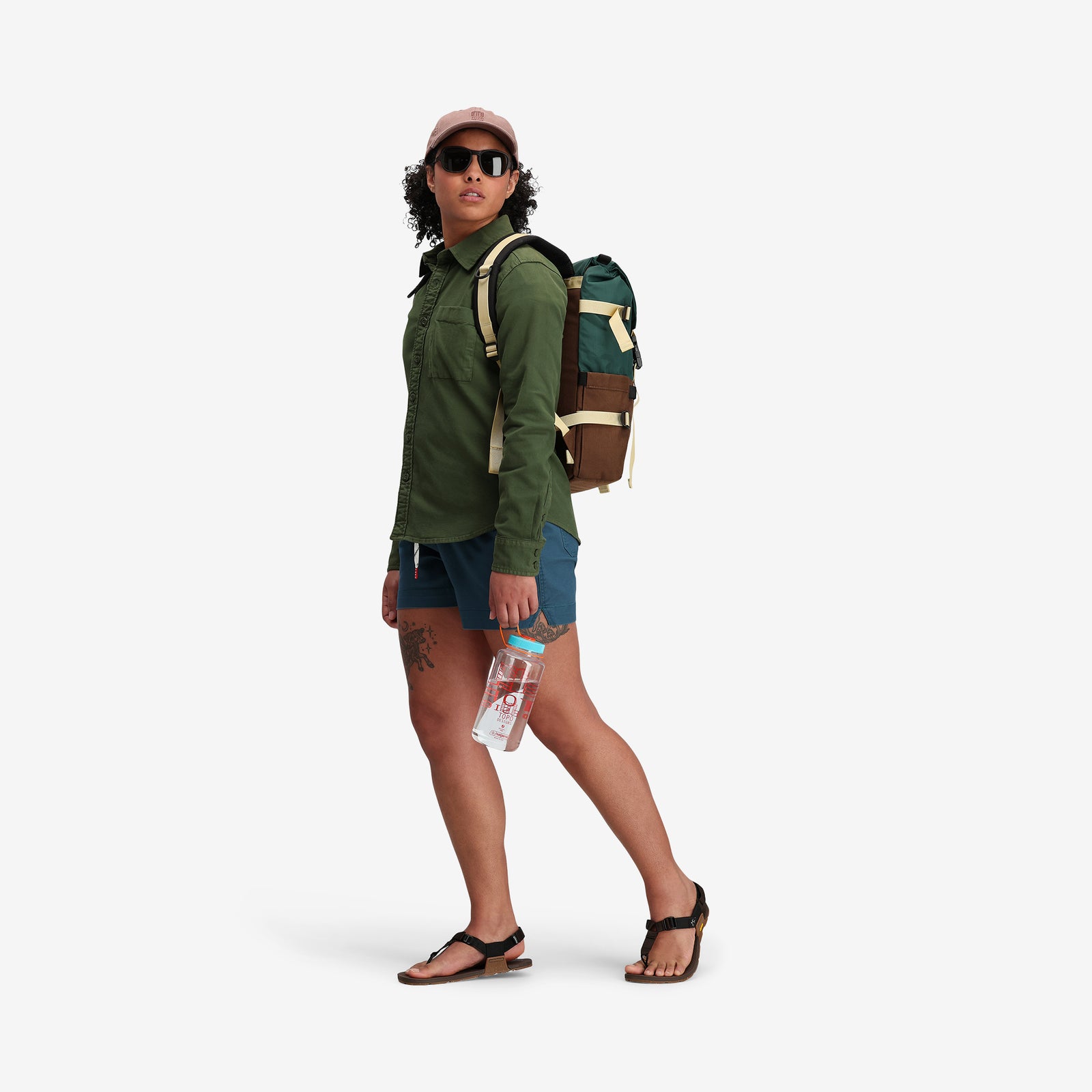 Model shot of Topo Designs Women's Dirt Shirt in "Olive" Green.