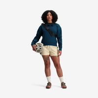 General model shot of Topo Designs Women's Dirt Crew sweatshirt in 100% organic cotton French terry in "Pond Blue".