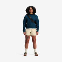 General model shot of Topo Designs Women's Dirt Crew sweatshirt in 100% organic cotton French terry in "Pond Blue".