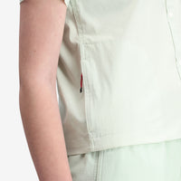 Detail shot of right zipper pocket of Topo Designs Women's Global Shirt Short Sleeve 30+ UPF rated travel shirt in "Light Mint".