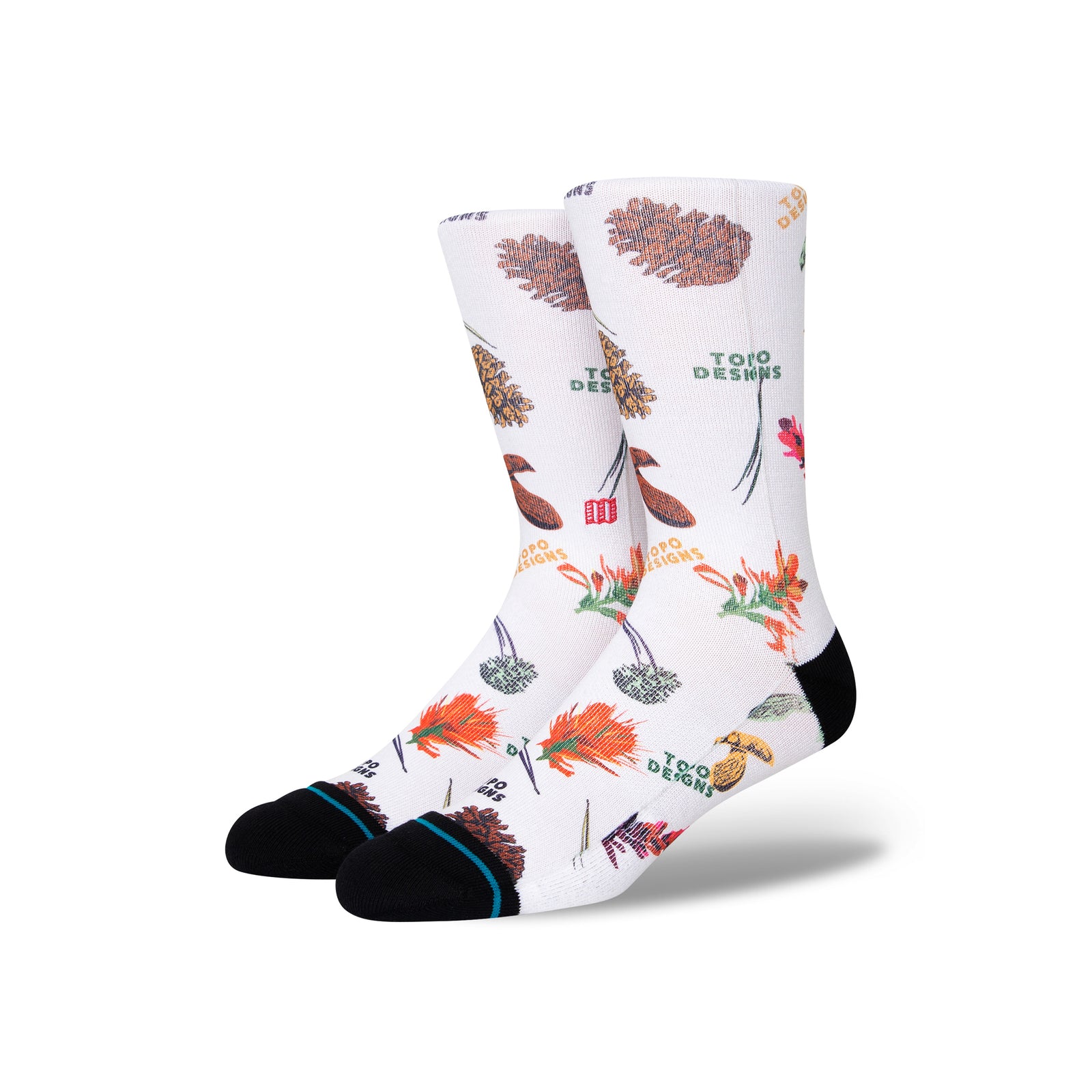 Topo Designs x Stance Crew Socks with wildflowers, pinecones, and mushrooms graphic print.