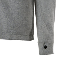 General detail shot of men's wool shirt in gray showing sleeve cuff