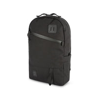 Topo Designs Daypack Tech 100% recycled nylon backpack with external laptop access in "Black".