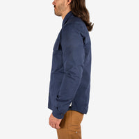 General close-up side model shot of Men's Topo Designs Insulated Shirt Jacket in Navy blue.