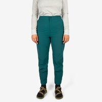 Close-up front model shot of Topo Designs Women's Lightweight Tech Pants in "Juniper" green.