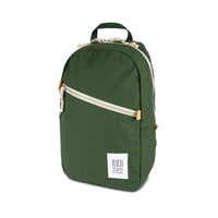 3/4 front product shot of Topo Designs Light Pack in "Forest" green canvas.