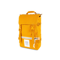 3/4 front product shot of Topo Designs Rover Pack Mini in "Mustard" yellow canvas.