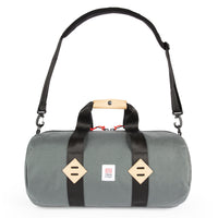General shot of Topo Designs Classic Duffel 20" canvas retro gym bag in Charcoal gray showing shoulder strap.
