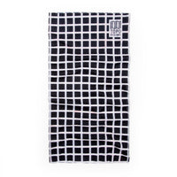 Topo Designs Neck Gaiter in Black and White "Grid - Final Sale" print.
