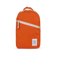 Topo Designs Light Pack in "Clay" orange canvas.