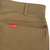 General shot of Topo Designs Men's Global Pants lightweight cotton nylon travel pants in Dark Khaki brown showing zipper back pockets.