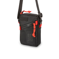 Topo Designs Mini Shoulder Bag crossbody travel purse in "Black" recycled nylon.