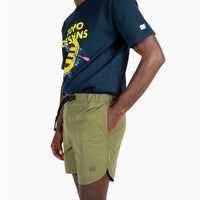 General shot of Topo Designs Men's River Shorts Lightweight quick dry swim trunks on model Olive green.