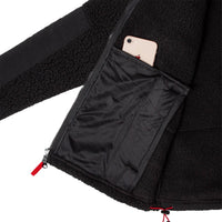 General detail product shot of the men's subalpine fleece in black showing interior pocket details.