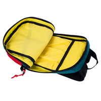 Detail shot of Topo Designs x Alternative Trip Pack in red/teal showing yellow lining inside